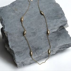 MONET Liz Claiborne Long Gold Tone Accent Open Cut work Beaded Necklace 34" NWOT